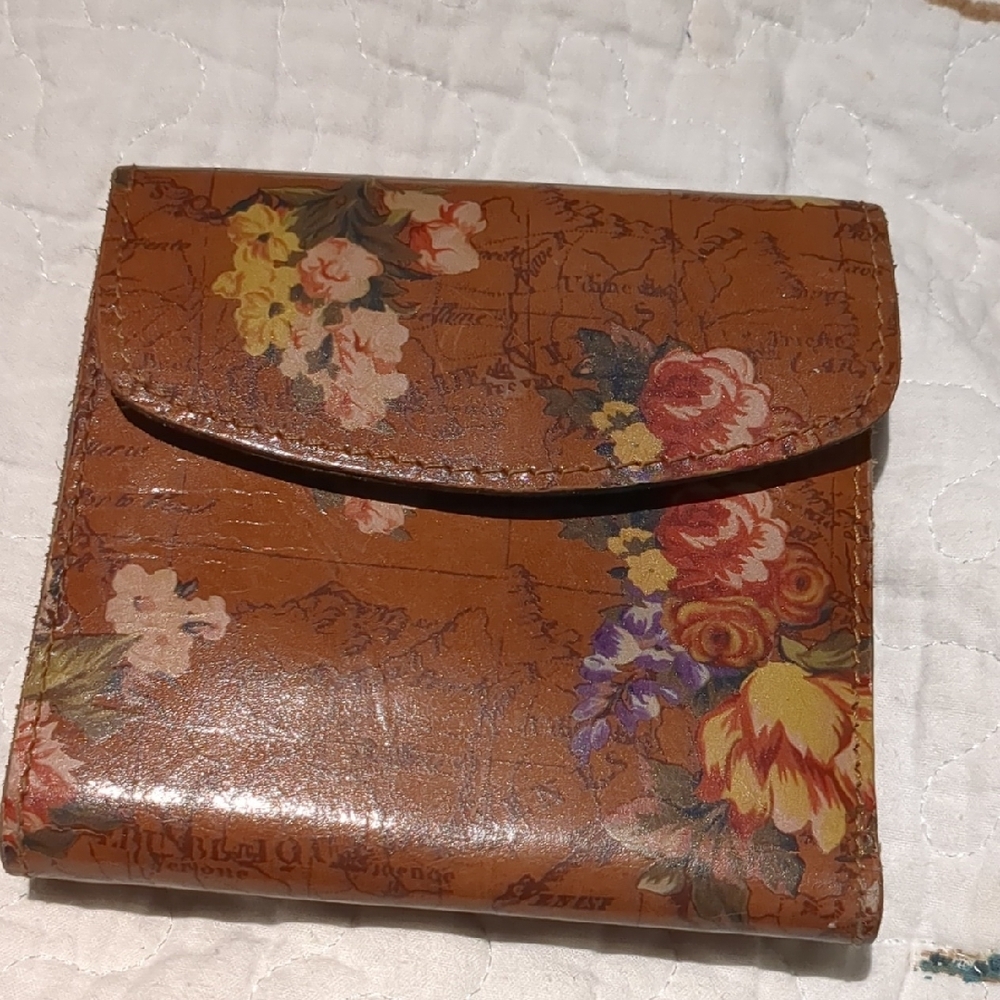 Floral Brown Leather Wallet. Comes w dust bag.